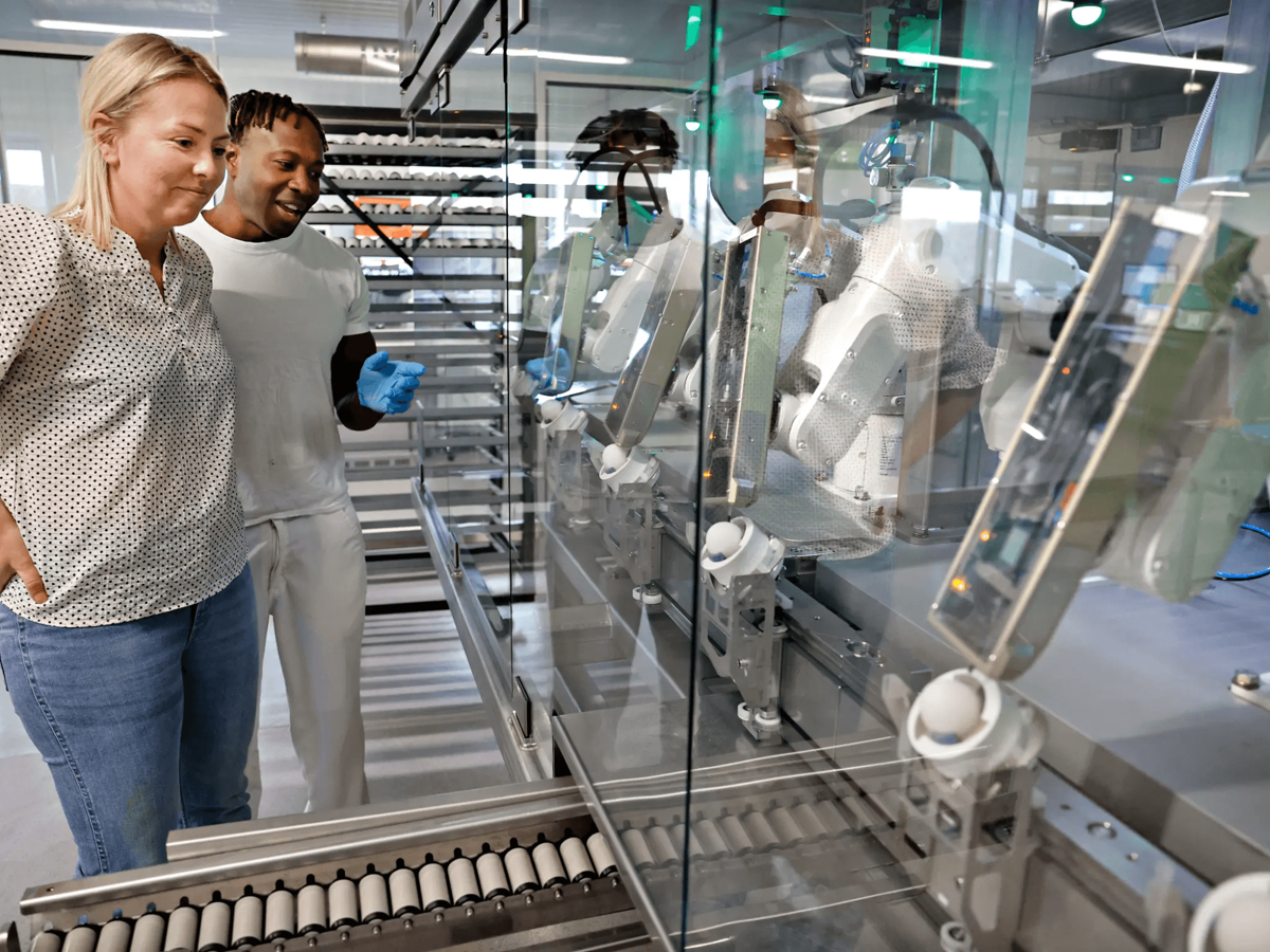 Tone Steinsland and Nash Mapfumba at the Steinsland Hatchery